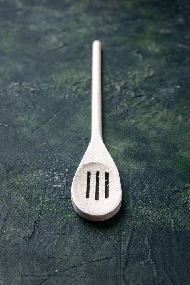 The handle of a silicone spatula can be used for insertion due to its flexibility.
